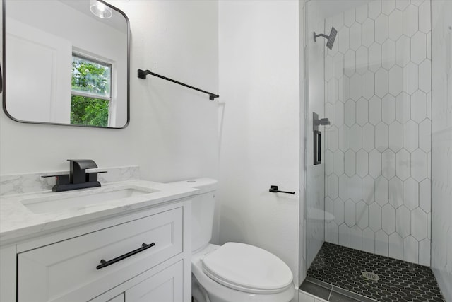 4709 Shady Hill Dr, Forest Hill, TX 76119 - bathroom featuring a stall shower, toilet, and vanity