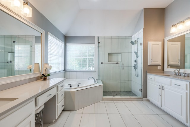 5060 Loma Alta Dr, Frisco, TX 75034 - bathroom with tile patterned floors, lofted ceiling, a shower stall, two vanities, and a garden tub