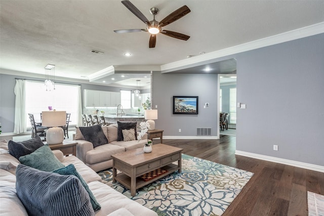 5060 Loma Alta Dr, Frisco, TX 75034 - living room featuring ornamental molding, ceiling fan, baseboards, wood finished floors, and recessed lighting
