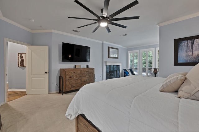 1123 Shadetree Ln, Allen, TX 75013 - carpeted bedroom with crown molding, a fireplace, ceiling fan, and baseboards