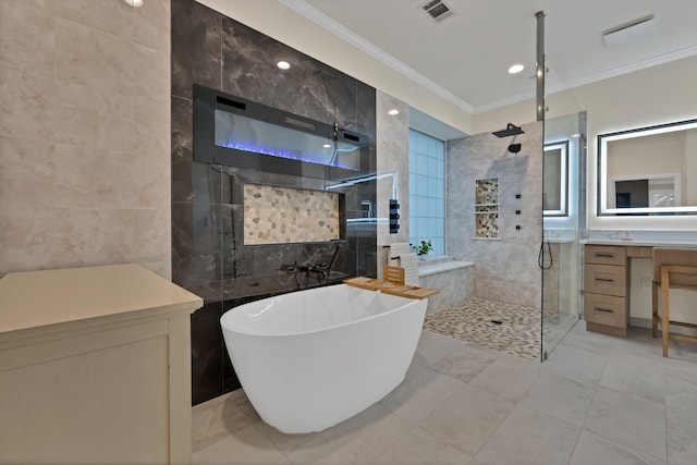 1123 Shadetree Ln, Allen, TX 75013 - bathroom with tile walls, crown molding, a walk in shower, vanity, and a freestanding tub