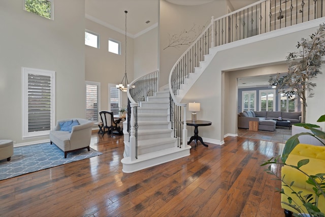 1123 Shadetree Ln, Allen, TX 75013 - foyer entrance with stairway, plenty of natural light, hardwood / wood-style floors, a towering ceiling, and baseboards