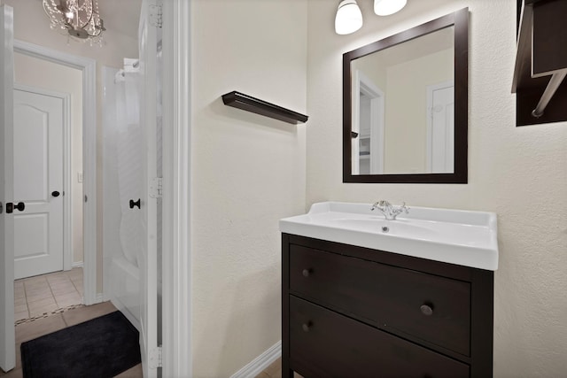 1123 Shadetree Ln, Allen, TX 75013 - bathroom featuring vanity, tile patterned flooring, and shower / bath combo with shower curtain
