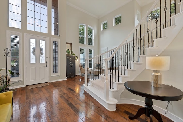 1123 Shadetree Ln, Allen, TX 75013 - entrance foyer with a high ceiling, wood-type flooring, crown molding, baseboards, and stairs