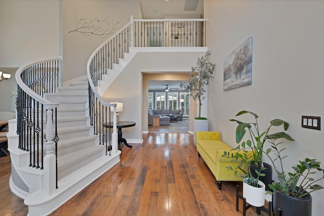 1123 Shadetree Ln, Allen, TX 75013 - entryway with stairs, hardwood / wood-style floors, a high ceiling, and baseboards