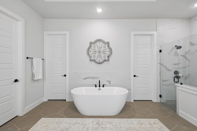 330 Peach Point Rd, Prosper, TX 75078 - bathroom featuring a stall shower, a freestanding tub, recessed lighting, and tile patterned floors