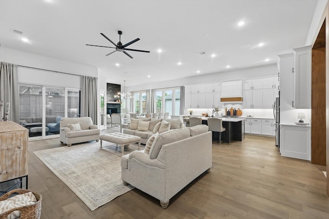 330 Peach Point Rd, Prosper, TX 75078 - living area featuring ceiling fan, light wood-style flooring, and recessed lighting