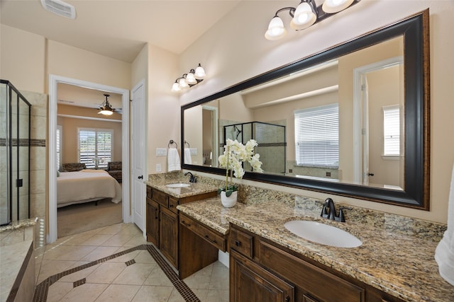 864 Gaited Trl, Frisco, TX 75036 - ensuite bathroom featuring tile patterned flooring, a stall shower, double vanity, and a ceiling fan
