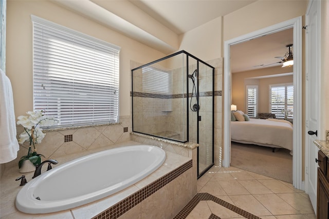 864 Gaited Trl, Frisco, TX 75036 - ensuite bathroom featuring tile patterned floors, a shower stall, a bath, and ceiling fan