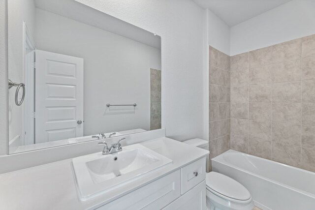 4342 Hudson St, Fate, TX 75087 - bathroom featuring toilet, vanity, and  shower combination