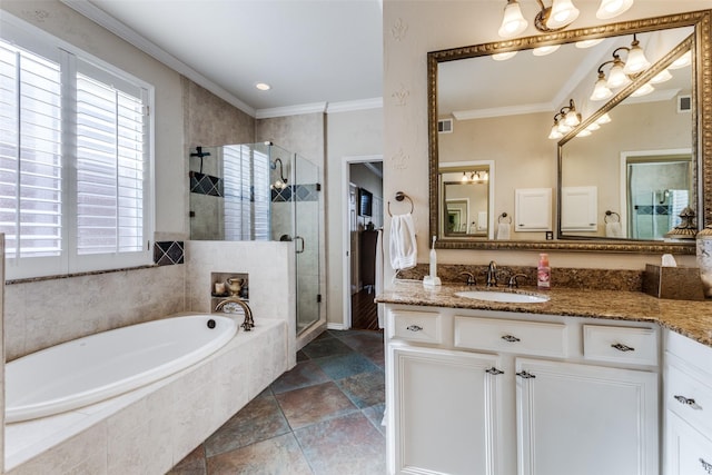 2420 Norwich Dr, Carrollton, TX 75006 - full bathroom featuring healthy amount of natural light, a garden tub, a shower stall, vanity, and crown molding