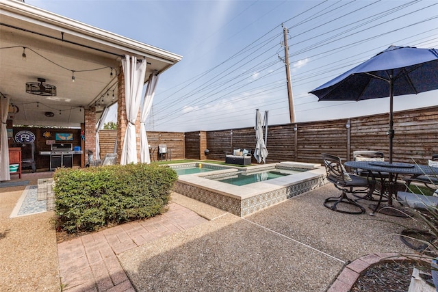 2420 Norwich Dr, Carrollton, TX 75006 - view of patio with a fenced backyard and a pool with connected hot tub