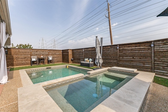 2420 Norwich Dr, Carrollton, TX 75006 - view of swimming pool featuring a fenced backyard and a pool with connected hot tub