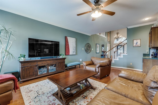 2420 Norwich Dr, Carrollton, TX 75006 - living room with ornamental molding, stairway, a chandelier, light wood-type flooring, and a ceiling fan