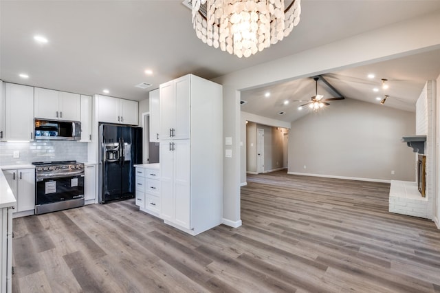 7013 Post Oak Dr, North Richland Hills, TX 76182 - kitchen featuring stainless steel appliances, light countertops, tasteful backsplash, open floor plan, and recessed lighting