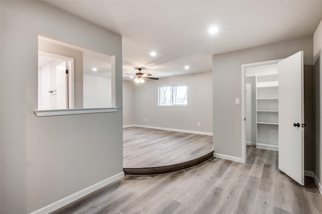 7013 Post Oak Dr, North Richland Hills, TX 76182 - spare room with a ceiling fan, recessed lighting, and light wood-style floors
