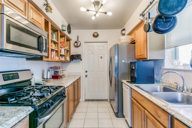 6900 Yorkston St, Watauga, TX 76148 - kitchen with stainless steel appliances, a sink, a chandelier, light tile patterned floors, and open shelves