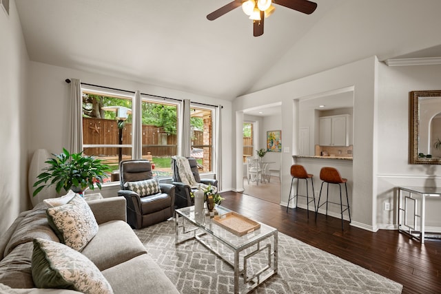 521 Austin Oaks Dr, Grapevine, TX 76051 - living area featuring ceiling fan, plenty of natural light, vaulted ceiling, hardwood / wood-style flooring, and baseboards