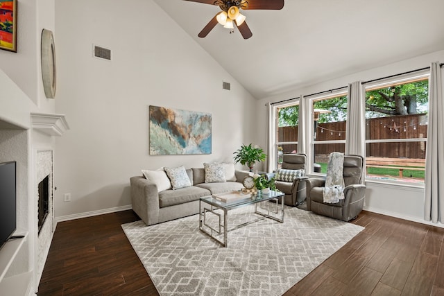 521 Austin Oaks Dr, Grapevine, TX 76051 - living room with ceiling fan, high vaulted ceiling, baseboards, wood finished floors, and a fireplace