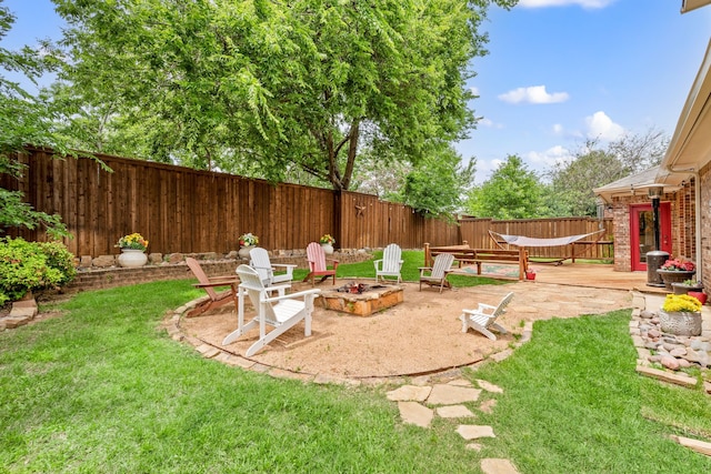 521 Austin Oaks Dr, Grapevine, TX 76051 - view of yard with a wooden deck and an outdoor fire pit