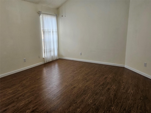 3406 Lake Highlands Dr, Rowlett, TX 75088 - unfurnished room featuring dark wood-style floors and baseboards
