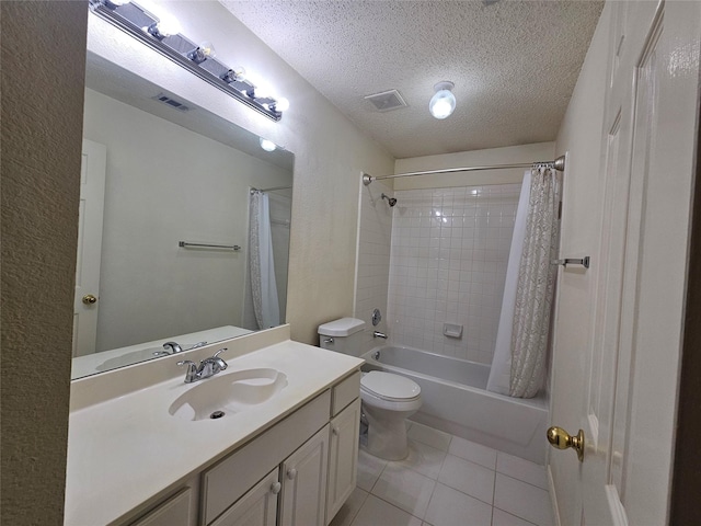 3406 Lake Highlands Dr, Rowlett, TX 75088 - full bath featuring tile patterned flooring, a textured ceiling, toilet, vanity, and shower / tub combo