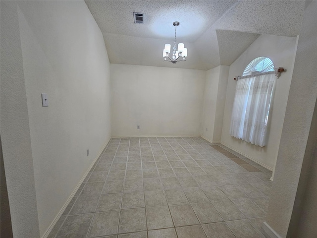 3406 Lake Highlands Dr, Rowlett, TX 75088 - unfurnished room featuring a chandelier, tile patterned floors, lofted ceiling, and a textured ceiling