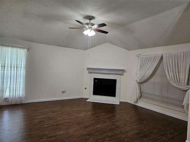 3406 Lake Highlands Dr, Rowlett, TX 75088 - unfurnished living room featuring a textured ceiling, ceiling fan, wood finished floors, lofted ceiling, and baseboards