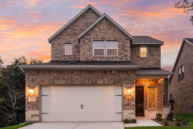 1301 Hickory Ct, Weatherford, TX 76086 - traditional home with brick siding, driveway, an attached garage, and stone siding