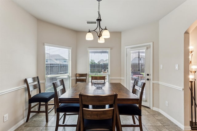 2314 Bob Sandlin Ln, Wylie, TX 75098 - dining area with light tile patterned flooring and baseboards