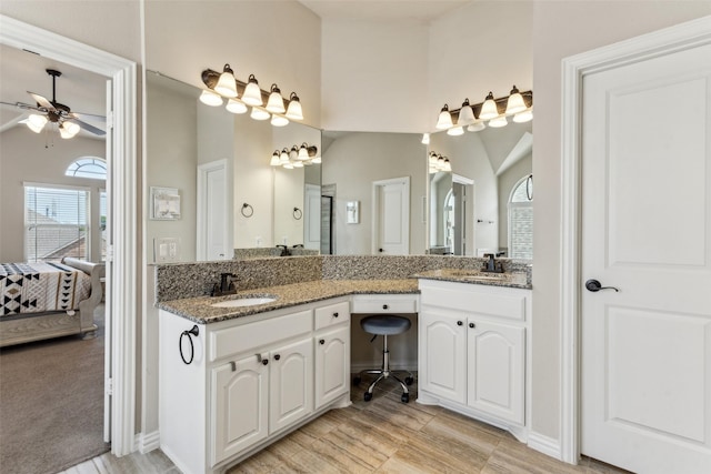 2314 Bob Sandlin Ln, Wylie, TX 75098 - full bathroom featuring ceiling fan, vaulted ceiling, double vanity, and baseboards