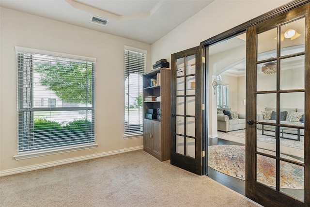 2314 Bob Sandlin Ln, Wylie, TX 75098 - entryway with french doors, arched walkways, baseboards, and a tray ceiling