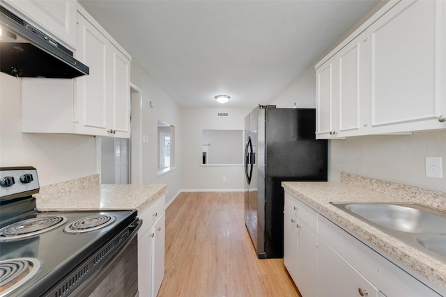 4914 Stagecoach Ln, Garland, TX 75043 - kitchen featuring electric range, under cabinet range hood, light wood-style flooring, white cabinets, and light countertops