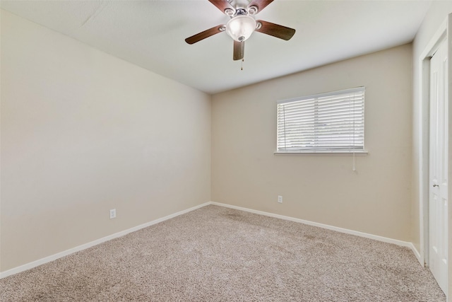 4914 Stagecoach Ln, Garland, TX 75043 - spare room with carpet floors, a ceiling fan, and baseboards