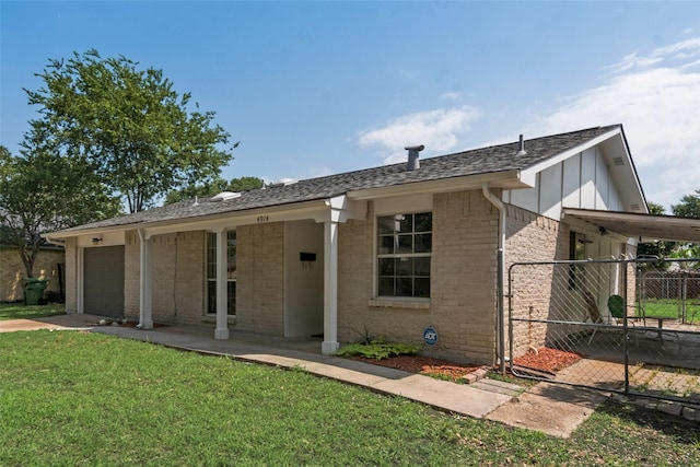 4914 Stagecoach Ln, Garland, TX 75043 - single story home with an attached garage, brick siding, concrete driveway, board and batten siding, and roof with shingles