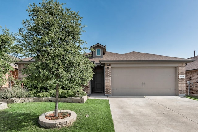 6128 Blacksmith Ave, Fort Worth, TX 76179 - view of front of home with brick siding, concrete driveway, a garage, and a front yard