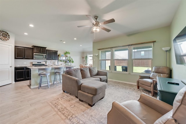 6128 Blacksmith Ave, Fort Worth, TX 76179 - living room with ceiling fan, light wood-style floors, plenty of natural light, and recessed lighting