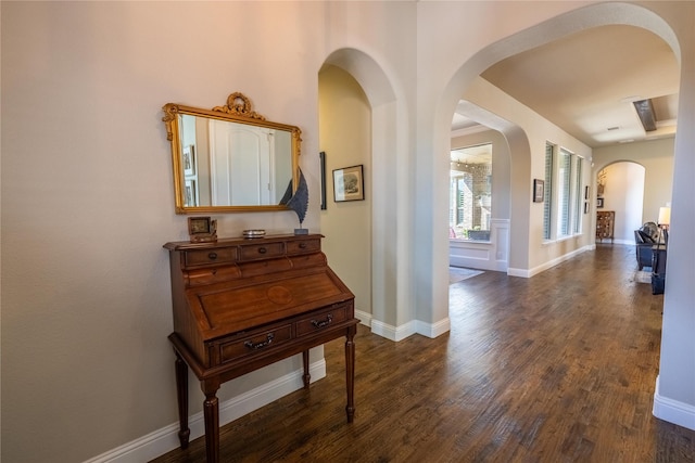 4207 Pearl Crescent Ln, Arlington, TX 76005 - hall featuring arched walkways, wood finished floors, and baseboards