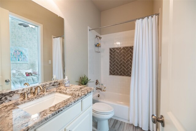 4207 Pearl Crescent Ln, Arlington, TX 76005 - full bathroom featuring toilet, shower / bath combination with curtain, and vanity
