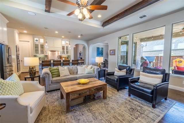 4207 Pearl Crescent Ln, Arlington, TX 76005 - living area with arched walkways, ceiling fan, recessed lighting, wood finished floors, and beam ceiling