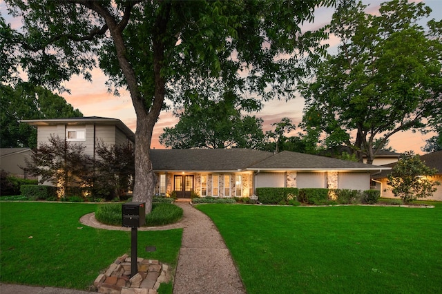10636 Cox Ln, Dallas, TX 75229 - view of front of property featuring a front lawn and french doors