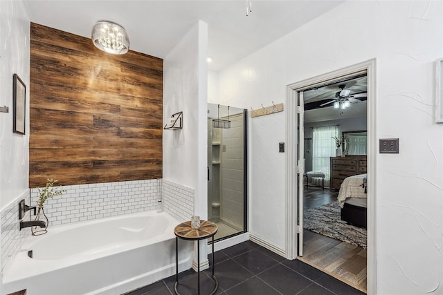 301 Shepherd Ln, Royse City, TX 75189 - ensuite bathroom with tile patterned floors, a bath, a stall shower, and a ceiling fan