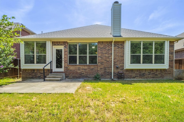 1716 Lake Way Dr, Little Elm, TX 75068 - back of property featuring entry steps, a patio, a chimney, brick siding, and a shingled roof