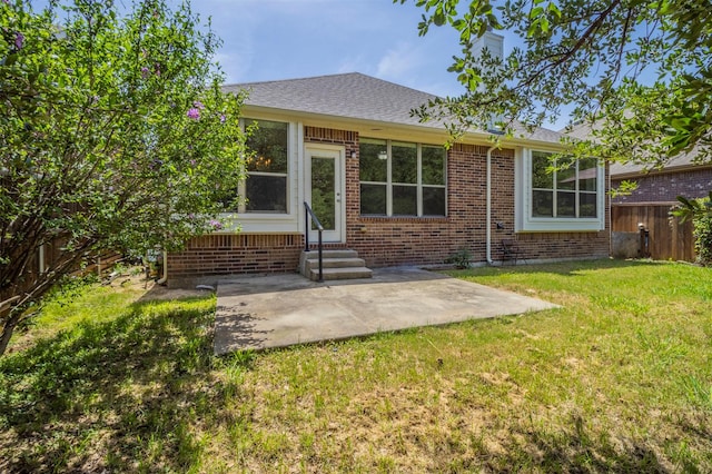 1716 Lake Way Dr, Little Elm, TX 75068 - rear view of property featuring entry steps, brick siding, a patio area, and roof with shingles