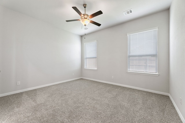 3510 Riley St, Fate, TX 75087 - spare room featuring carpet floors, a ceiling fan, and baseboards