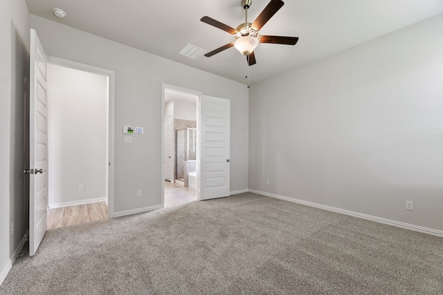 3510 Riley St, Fate, TX 75087 - unfurnished bedroom with carpet, baseboards, connected bathroom, and ceiling fan