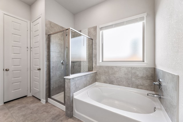 3510 Riley St, Fate, TX 75087 - bathroom with a shower stall and a garden tub