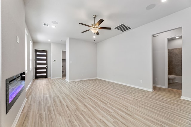 3510 Riley St, Fate, TX 75087 - unfurnished living room with ceiling fan, light wood finished floors, recessed lighting, and baseboards