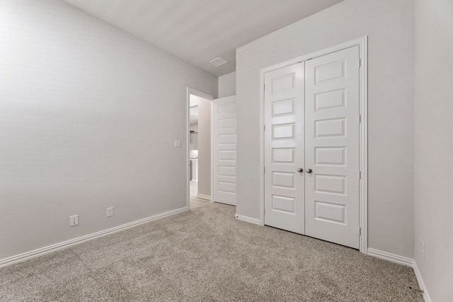 3510 Riley St, Fate, TX 75087 - unfurnished bedroom featuring carpet floors, a closet, and baseboards