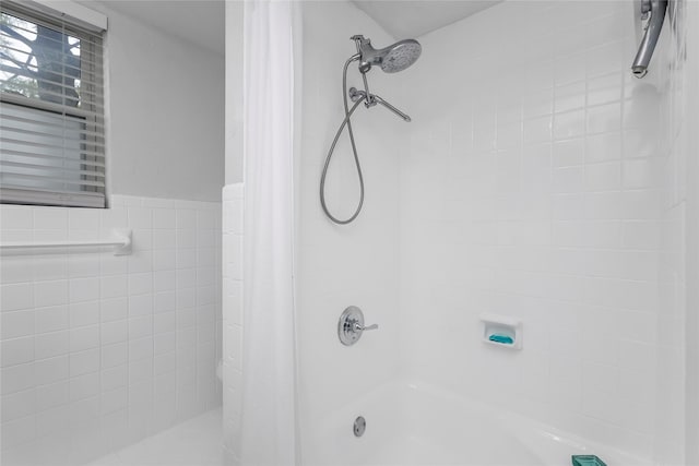 5845 E University Blvd Unit A, Dallas, TX 75206 - bathroom with shower / bathtub combination with curtain